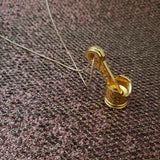 Gold Piston Necklace